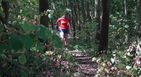 Caucasian girl Nikki Dream gets caught taking a piss while in a forest 10999561