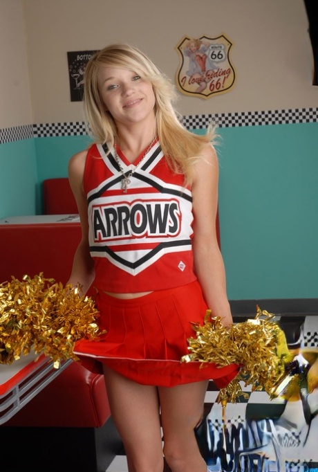 Cute blonde Tegan Summers models non nude in her cheerleader uniform 90156405